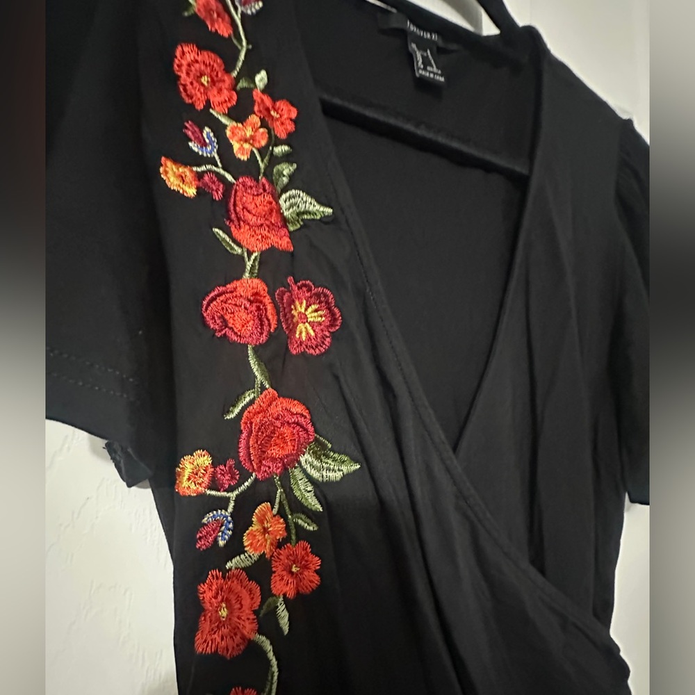 Black embroidered body con mini dress